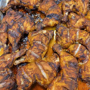 a tray of cooked chicken