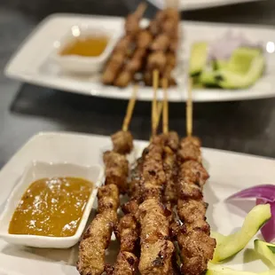 skewered food on a plate