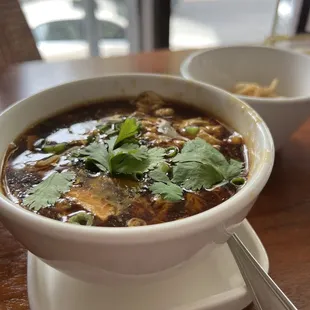 a bowl of soup on a table