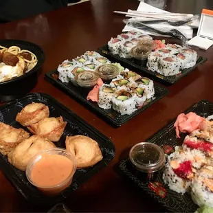 Sushi (spicy tuna, salmon avocado, eel) and Crabmeat Rangoon (5 PCS)