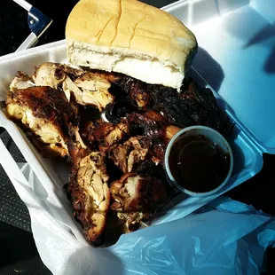 Grilled Jerk chicken, coco bread