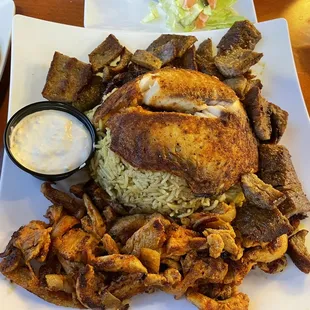 Main platter with small view of salad