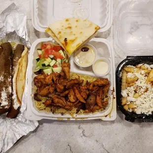 Lamb and beef gyro, chicken shawarma plate, Greek fries. IG: @take.a.bite.with.me