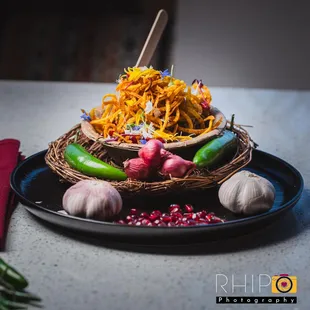 a plate of vegetables and herbs