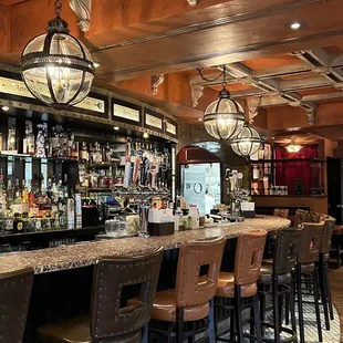 a bar with a lot of stools