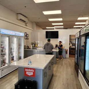 a man and a woman in the kitchen
