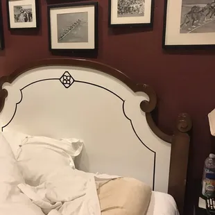 Overly used yellow stained pillow on the bed.