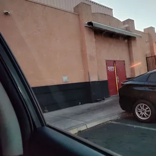 "entrance" of their kitchen; all orders are online or by text and they bring out drinks to your car