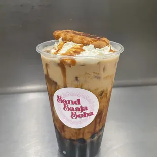 Brown Sugar Boba Masala Chai, served with a Parle G cookie