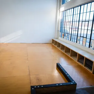 Studio East birch wood floor with ADA-accessible ramp