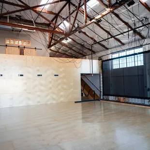 Studio West wood floor, trampoline wall, and ADA-accessible ramp