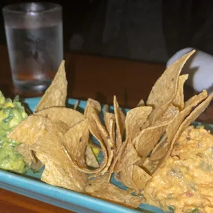 a plate of chips and guacamole