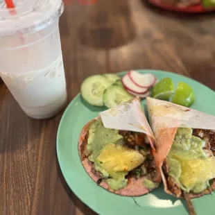 $13.66 tax included two al pastor tacos with regular size horchata. Better deal on Taco Tuesday :)