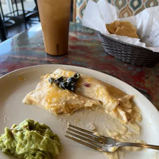 Oops! Could not wait to eat . The presentation was amazing before I dug in to the enchiladas