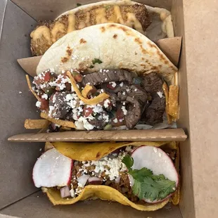 Top to bottom: Dynamite Fish Taco, Street Steak Taco, Chorizo Taco