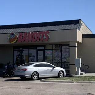 a car parked in front of the building