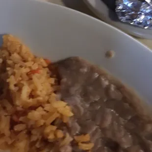 Half eaten beans and rice.