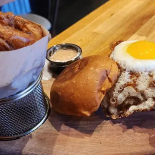 Double cowboy with sunny side up egg and onion rings