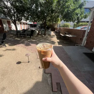 Large White Lodge Latte and part of the patio space to the left of the stand.