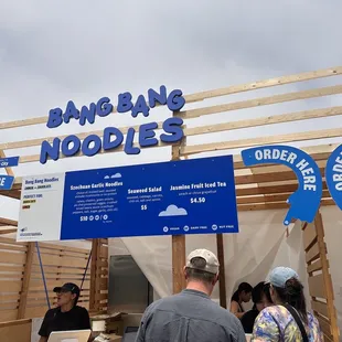 a group of people at a booth