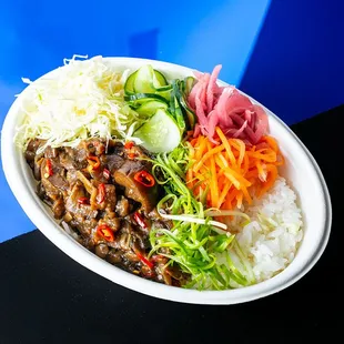 Rice Bowl with warm rice, pickled onion, cabbage &amp; spicy eggplant