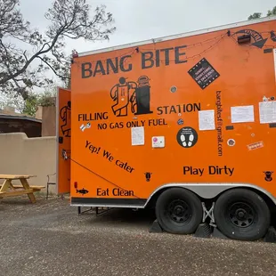 an orange food truck