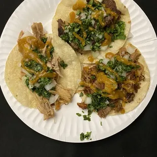 Chicken adobo.  Pork sisig and a beef Mechado taco
