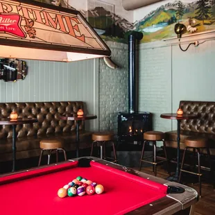 a pool table in a bar