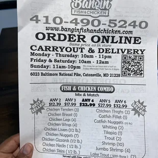  a hand holding a receipt