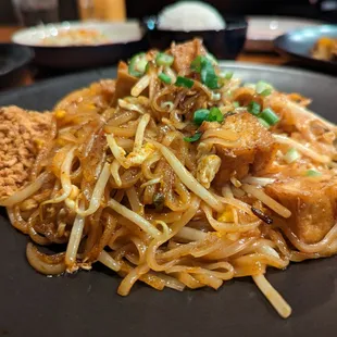 N1. Pad Thai with Tofu. $15. Pan-fried rice noodles, eggs, bean sprouts, scallions, ground peanuts with &quot;Bk54 Seasonings.&quot;