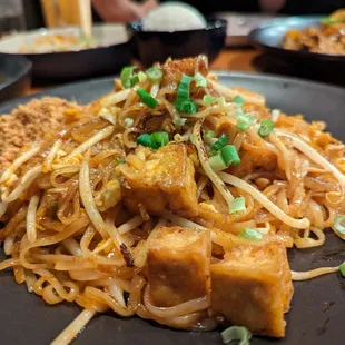 N1. Pad Thai with Tofu. $15. Pan-fried rice noodles, eggs, bean sprouts, scallions, ground peanuts with &quot;Bk54 Seasonings.&quot;