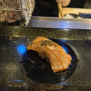 Seared salmon belly, truffle salt, crush seaweed powder