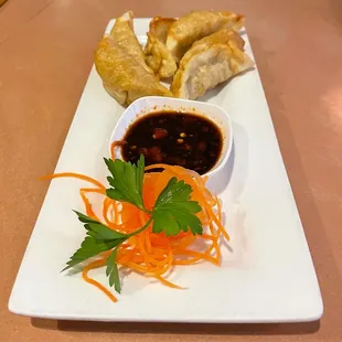The potsticker sauce is so good, and the potstickers are super crispy!