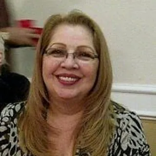 Ellie E.