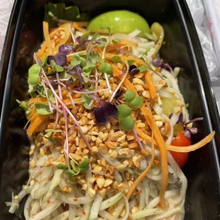 a salad in a plastic container