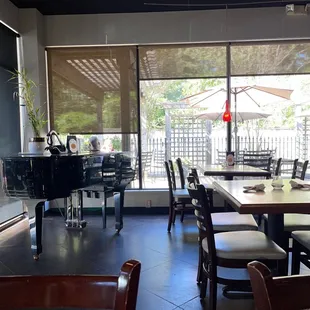 a restaurant with tables and chairs