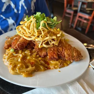 Dry chicken over curry noodles (special ad on tables for this) very good!