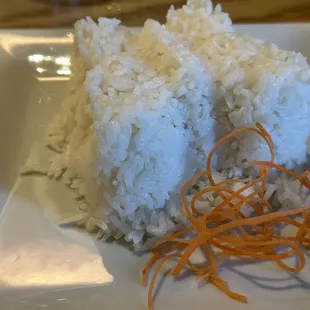 a plate of rice and carrots