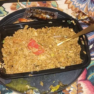 Here&apos;s the 2 lb of shitty rice that I got with my meal. I got hardly any protein! On a combo fried rice! These people are rip-off artists