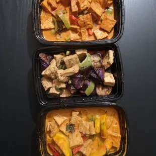 three containers of food
