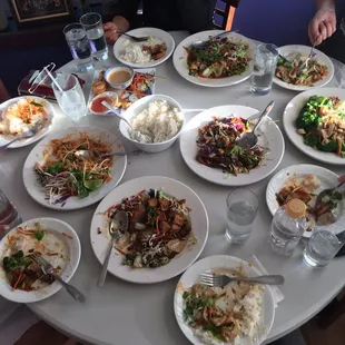 a table full of plates of food