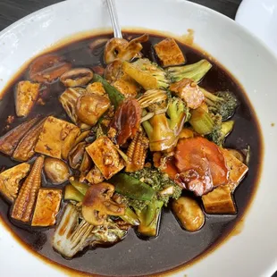 a bowl of asian food