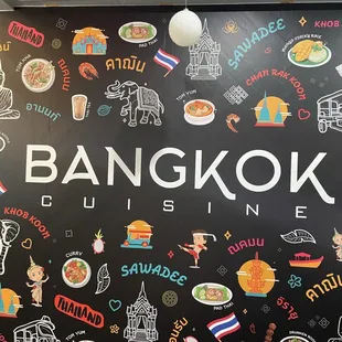 a blackboard with a variety of asian food items