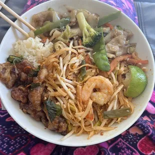 Crispy basil duck, shrimp pad Thai, and veggie drunken noodle