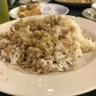 a plate of rice and vegetables