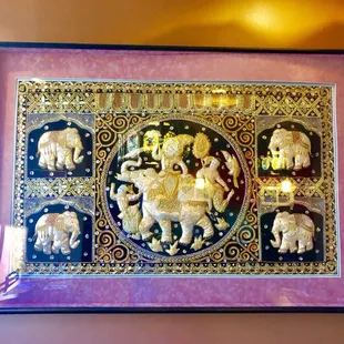 a picture of elephants in a frame
