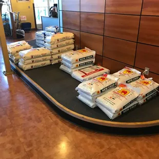 a conveyor belt loaded with packages of food