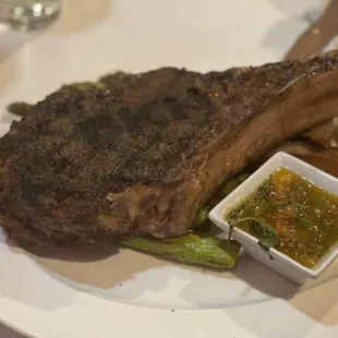 Tomahawk Ribeye with Grilled,asparagus,potato wedges and probably the best sauce I've had in quite a while