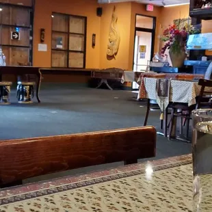 a view of the dining room from the bar