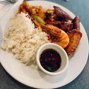 Plate of Jasmine Rice, Grilled Shrimp, Sweet &amp; Sour Flounder, BBQ Pork, Fried Chicken Wing and Pepper Fish Sauce
